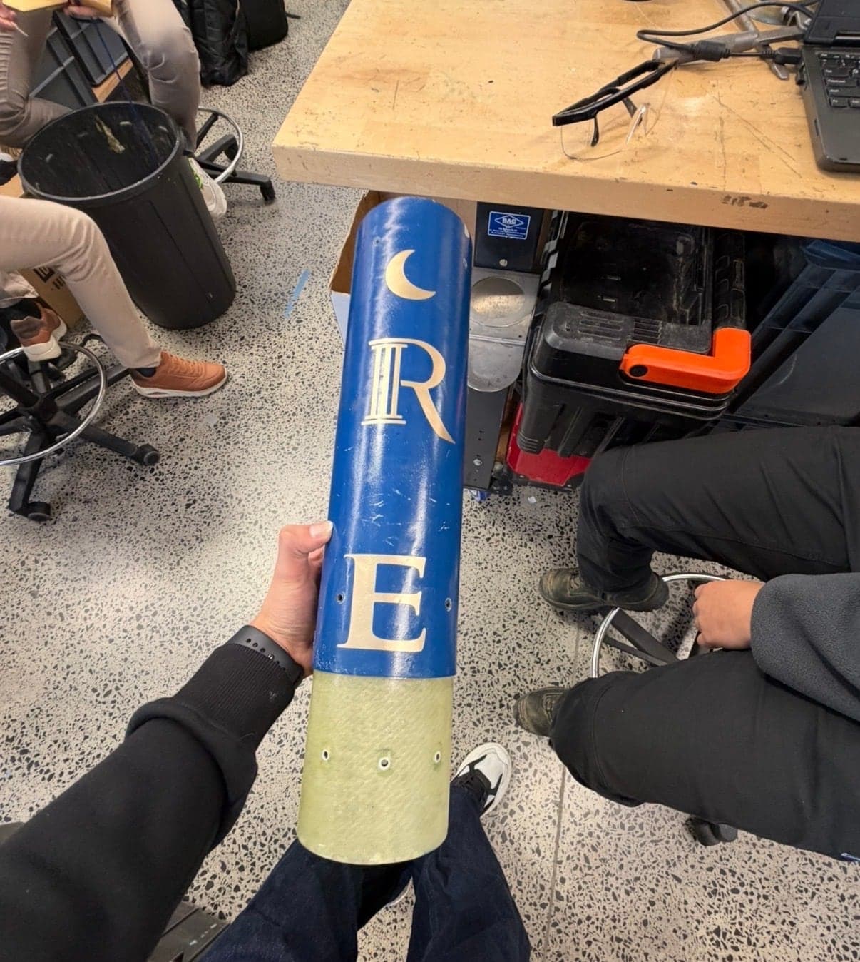 A finished blue airframe section with a fibreglass coupler